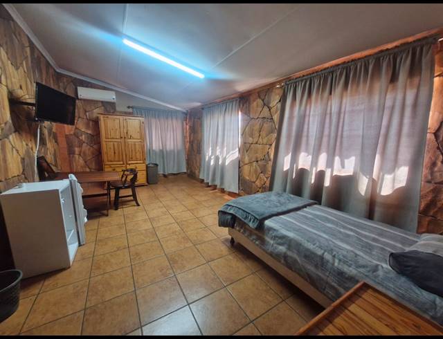 7 BEDROOM GUEST HOUSE FOR SALE IN DIBENG